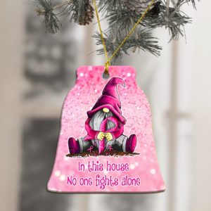 In This Home No One Fights Alone Gnome Sitting And Holding Breast Cancer Ribbon Bell Shape Ornament
